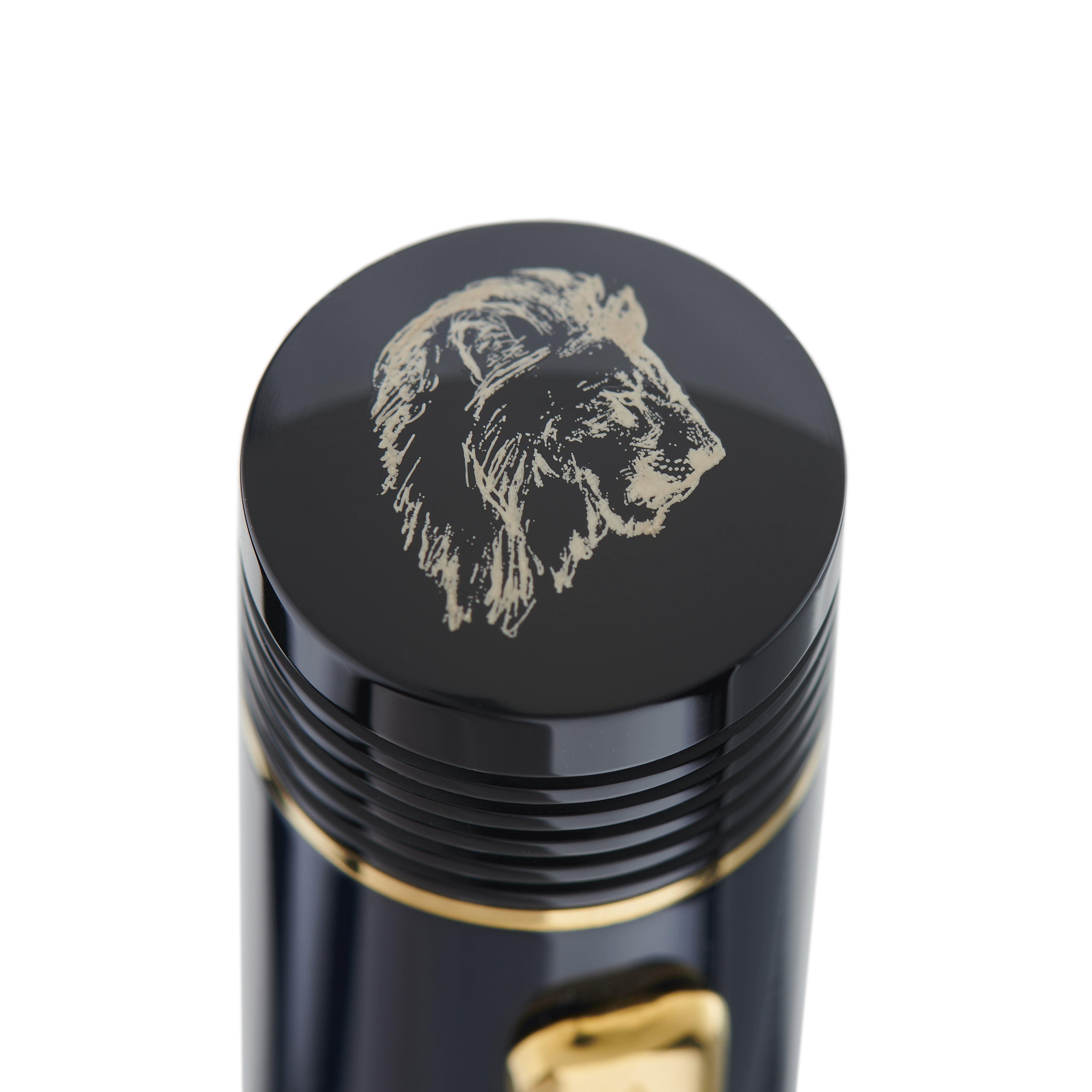 Ashmolean John Ruskin pen cap top engraved with a lion's head crest