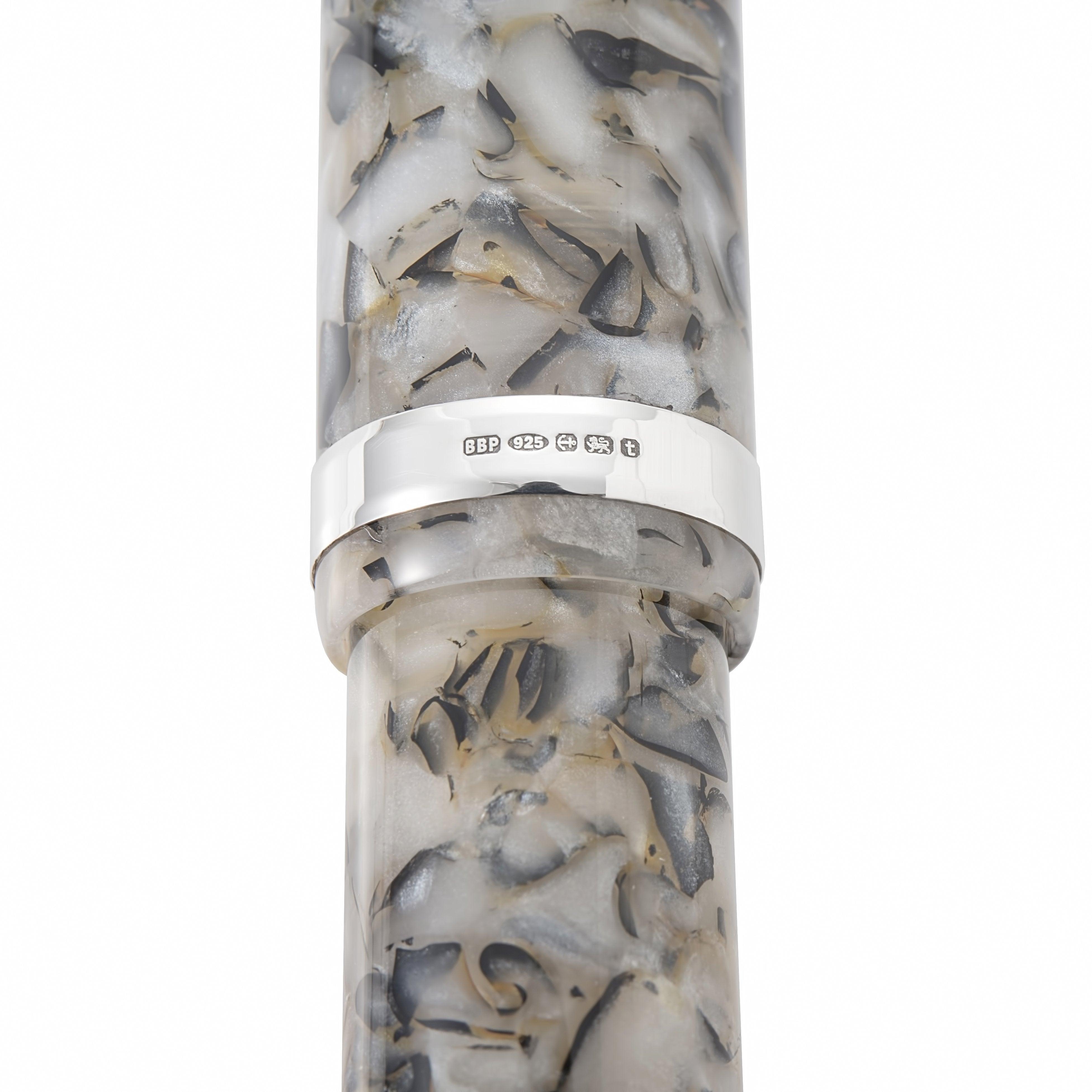 Close-up of the sterling silver cap band hallmark on the Churchill Quartz White