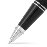 Close-up of the Churchill Wisteria rollerball tip and black grip section