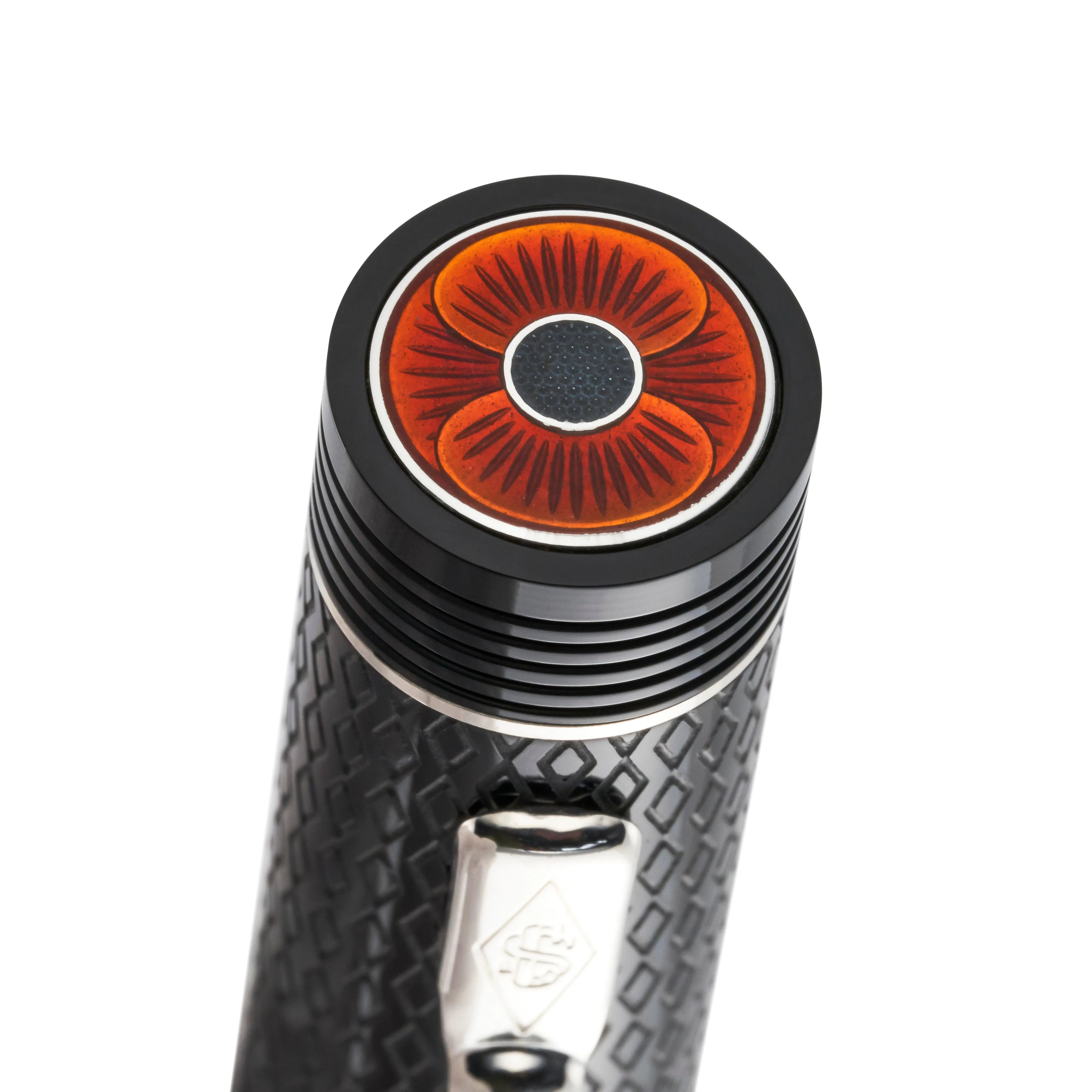 Close-up of the enamel poppy set into the cap top of the D-Day 80th Anniversary Pen